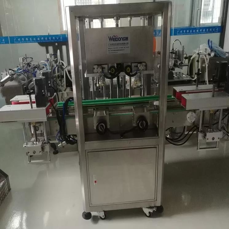 Cabezales cosméticos de la máquina de rellenar líquida del PLC del servomotor 2 para la botella de cristal